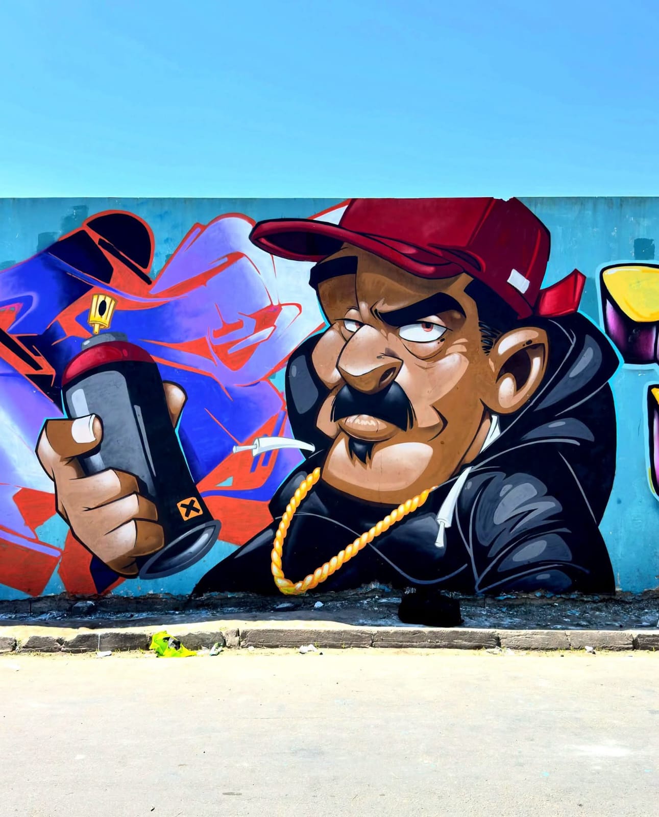 Illustrated BROOS graffiti world with a mural, van, canvas and live stage